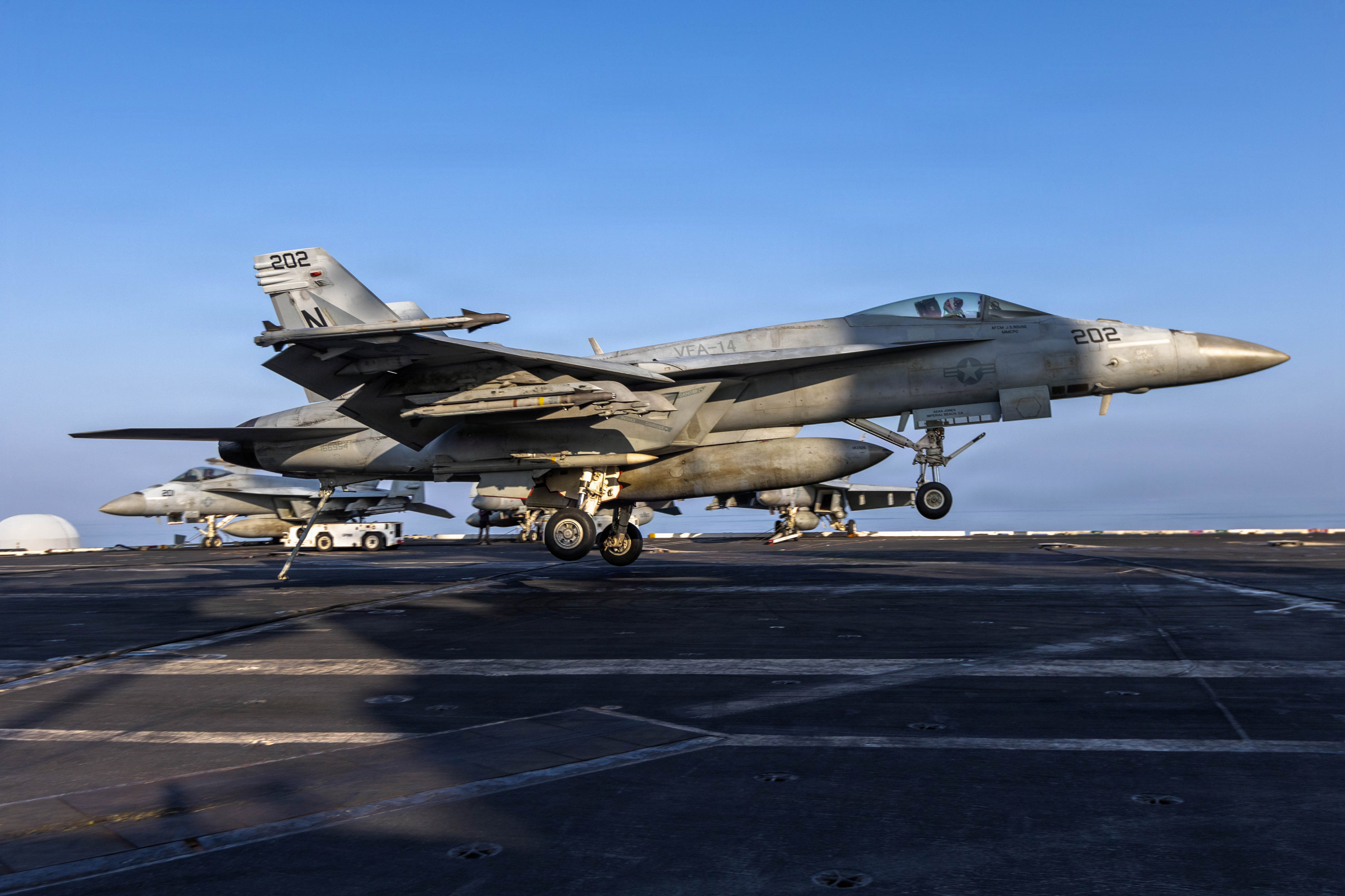 An F/A-18E Super Hornet, attached to Strike Fighter Squadron (VFA) 14, makes an arrested landing on the flight deck of Nimitz-class aircraft carrier USS Abraham Lincoln (CVN 72) in support of Operation Epic Fury, March 2, 2026. Abraham Lincoln is deployed to the U.S. 5th Fleet area of operations to support maritime security and stability in the Middle East. (U.S. Navy photo)