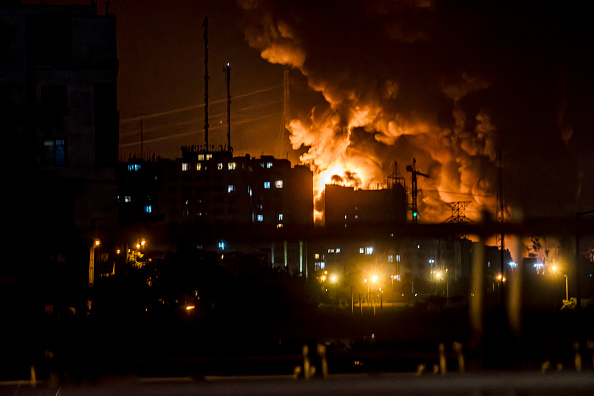 Somek rises as a location targeted by Israel is ablaze in Tehran amid the third day of Israel's waves of strikes against Iran, on Sunday, June 15, 2025. (Photo by Khoshiran / Middle East Images via AFP)