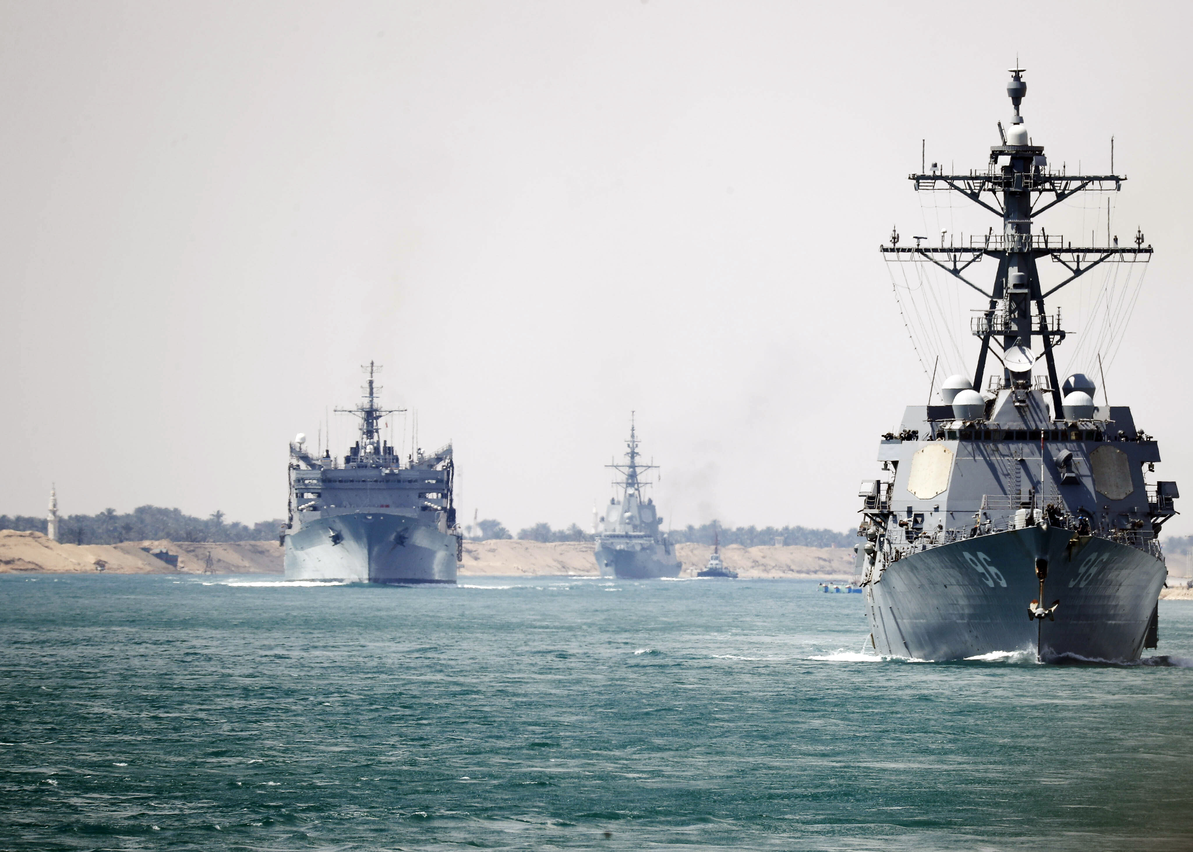190509-N-GH108-0211SUEZ CANAL (May 9, 2019) The Abraham Lincoln Carrier Strike Group transits the Suez Canal. The Abraham Lincoln Carrier Strike Group (ABECSG) is deployed to the U.S. Central Command area of responsibility in order to defend American forces and interests in the region. With Abraham Lincoln as the flagship, deployed strike group assets include staffs, ships and aircraft of Carrier Strike Group 12 (CSG 12), Destroyer Squadron 2 (DESRON 2), USS Leyte Gulf (CG 55) and Carrier Air Wing 7 (CVW 7); as well as the Spanish navy Àlvaro de Bazàn-class frigate ESPS Méndez Núñez (F 104). (U.S. Navy photo by Mass Communication Specialist 3rd Class Darion Chanelle Triplett/Released)