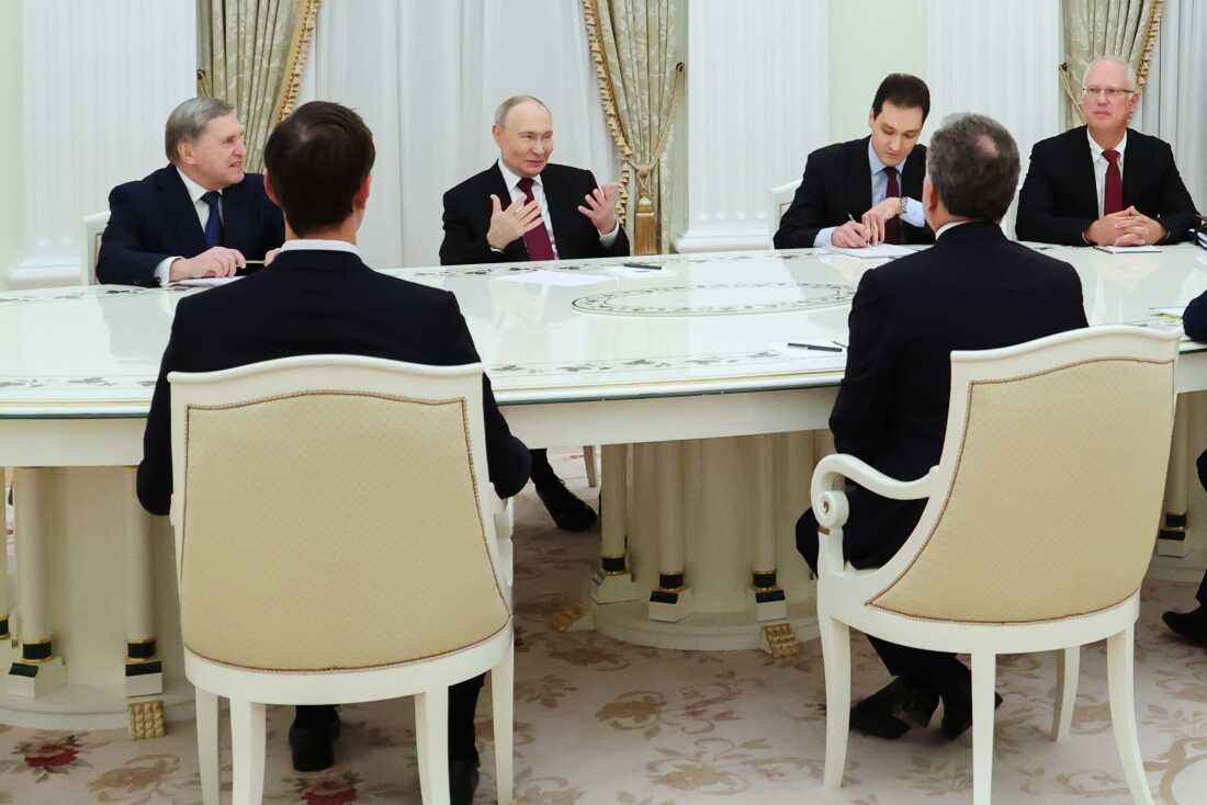 Russian President Vladimir Putin, second left, Russian Presidential foreign policy adviser Yuri Ushakov, left, and Russian Direct Investment Fund CEO Special Presidential Representative for Investment and Economic Cooperation with Foreign Countries Kirill Dmitriev, right, attend talks with U.S. special envoy Steve Witkoff, right back to a camera, and Jared Kushner, U.S. President Donald Trump's son-in-law, left back to a camera, at the Senate Palace of the Kremlin in Moscow, Russia, Tuesday, Dec. 2, 2025. (Alexander Kazakov, Sputnik, Kremlin Pool Photo via AP)
