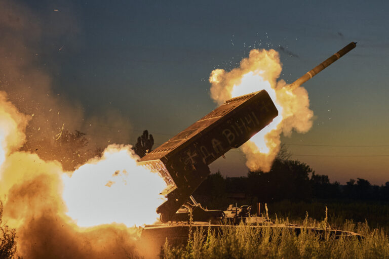 A Russian TOS-1A Solntsepyok heavy flamethrower rocket launcher, captured by the Ukrainian army battalion "Da Vinci", fires towards the Russian positions on the frontline near Kreminna, Luhansk region, Ukraine, Friday, July 7, 2023. Writing on its body reads "Da Vinci", a code name of the battalion commander Dmytro Kotsiubaylo, who was killed in battle. (AP Photo/Libkos)