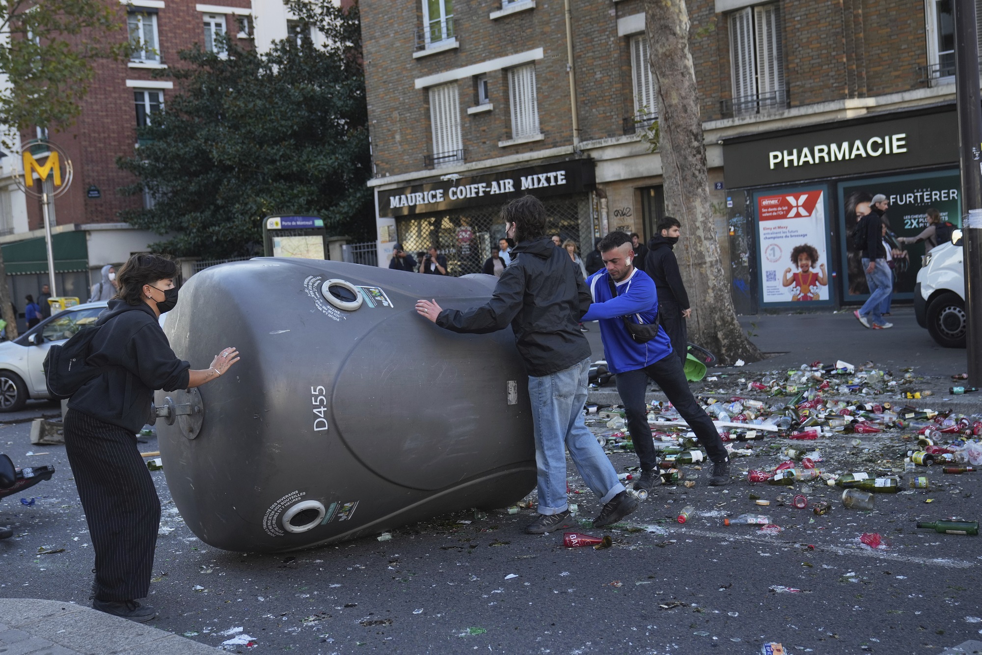 Protesters block a street during the "Bloquons Tout" (Block Everything) protest movement in Paris, Wednesday, Sept. 10, 2025. (AP Photo/Thibault Camus)