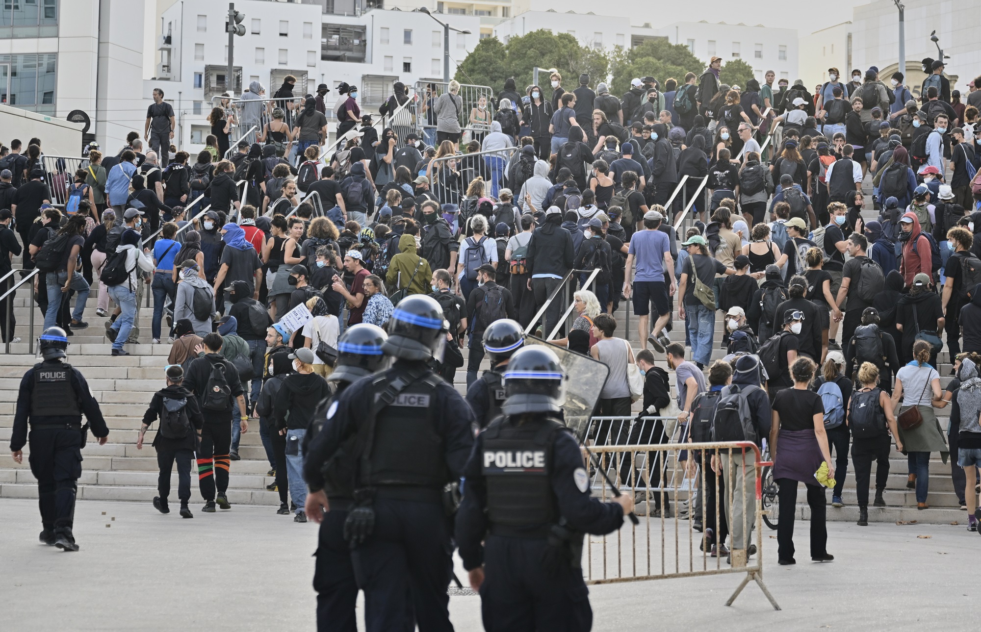 French police disperse protesters during a gathering of the "Block Everything" movement in Marseille, south of France, Wednesday, Sept. 10, 2025. (AP Photo/Philippe Magoni)