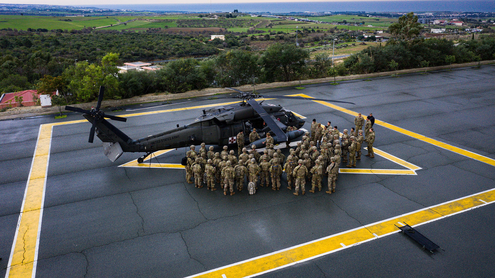 Paratroopers from 1st Battalion, 503rd Parachute Infantry Regiment form up around a UH-60 Blackhawk for aircraft familiarization during a training exercise at Camp Ken, Cyprus; Jan 16, 2020. Pilots and crew-members from 12th Combat Aviation Brigade instructed the Paratroopers on proper loading of litters, medical training and other aircraft familiarization.The 173rd Airborne Brigade is the U.S. Army’s Contingency Response Force in Europe, providing rapidly deployable forces to the United States Europe, Africa and Central Commands areas of responsibilities. Forward deployed across Italy and Germany, the brigade routinely trains alongside NATO allies and partners to build partnerships and strengthen the alliance.